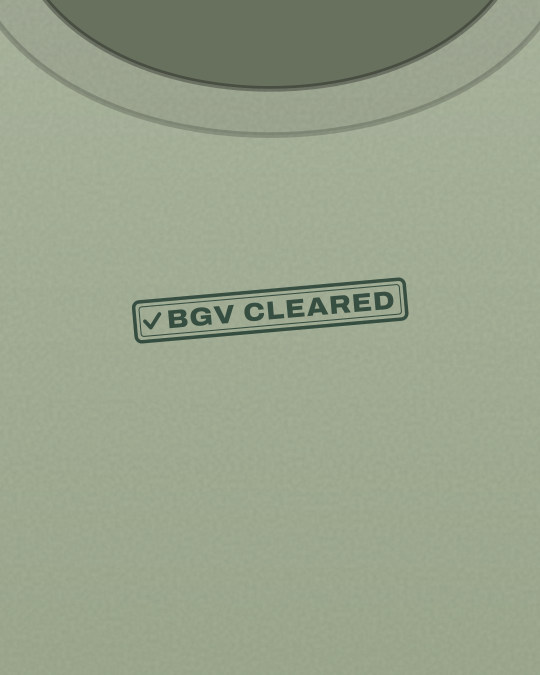 Close-up of the “BGV cleared” print in forest on a sage tee