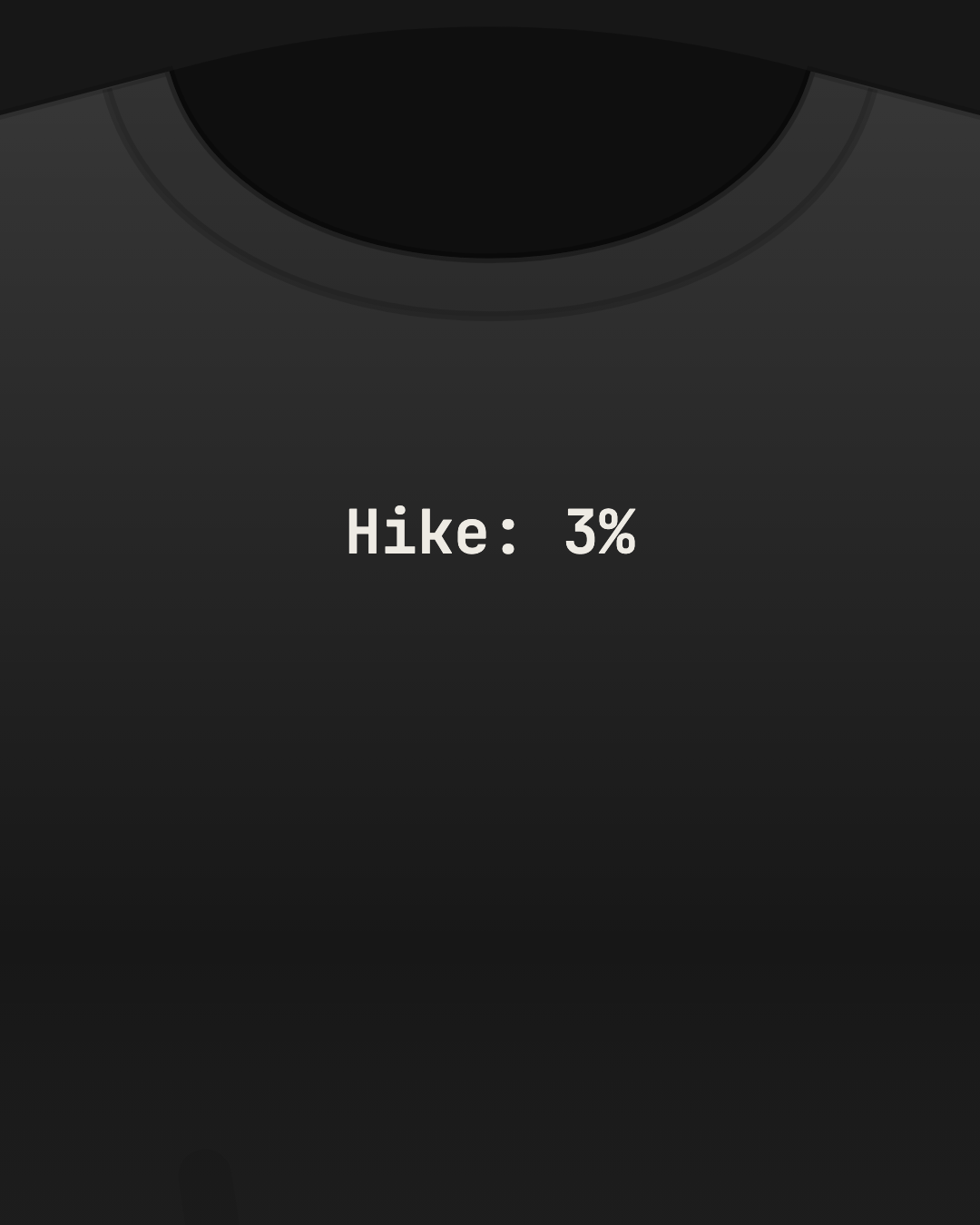 Close-up of a black tee with “Hike: 3%” printed small in off-white on the chest