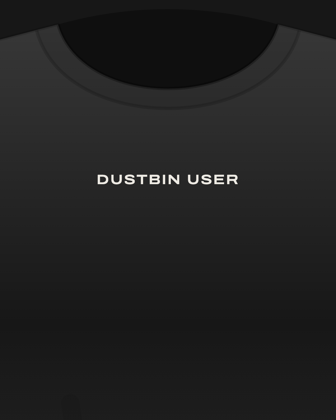 Close-up of a black tee with “dustbin user” printed small in off-white on the chest