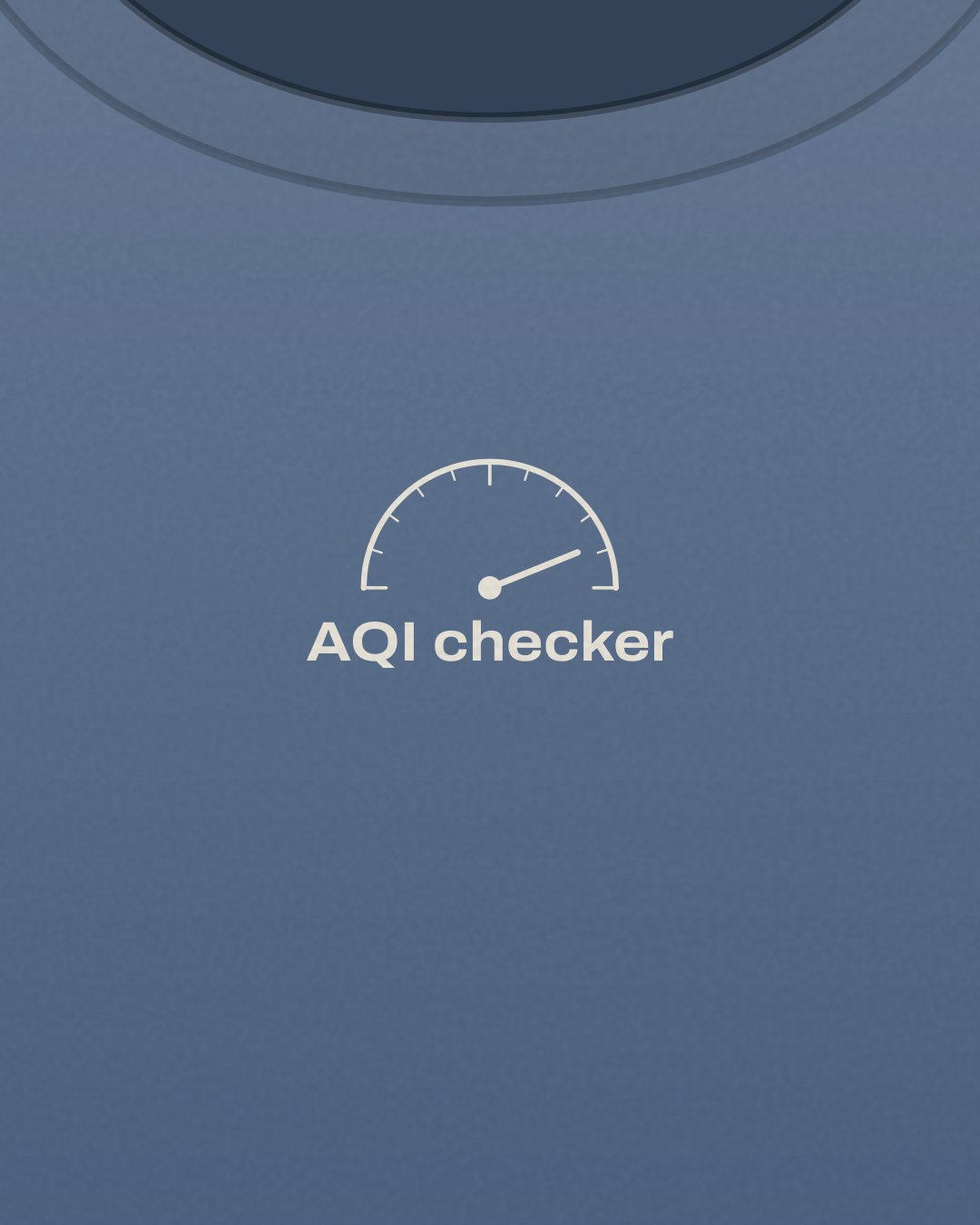 Close-up of the “AQI checker” print in cream on a slate blue tee