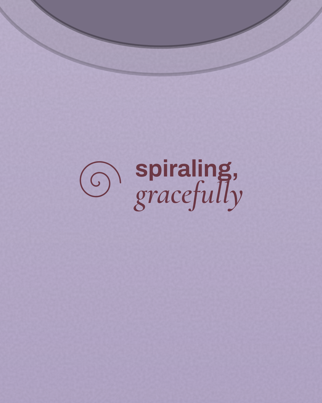 Close-up of the “spiraling, gracefully” print in burgundy on a lilac tee
