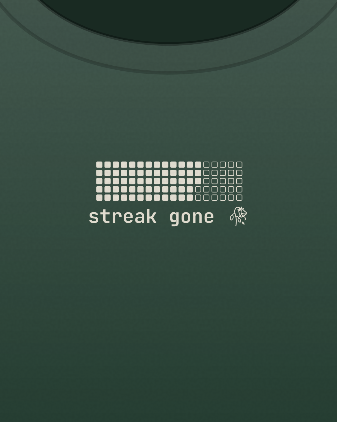 Close-up of the “streak gone 🥀” print in cream on a forest tee
